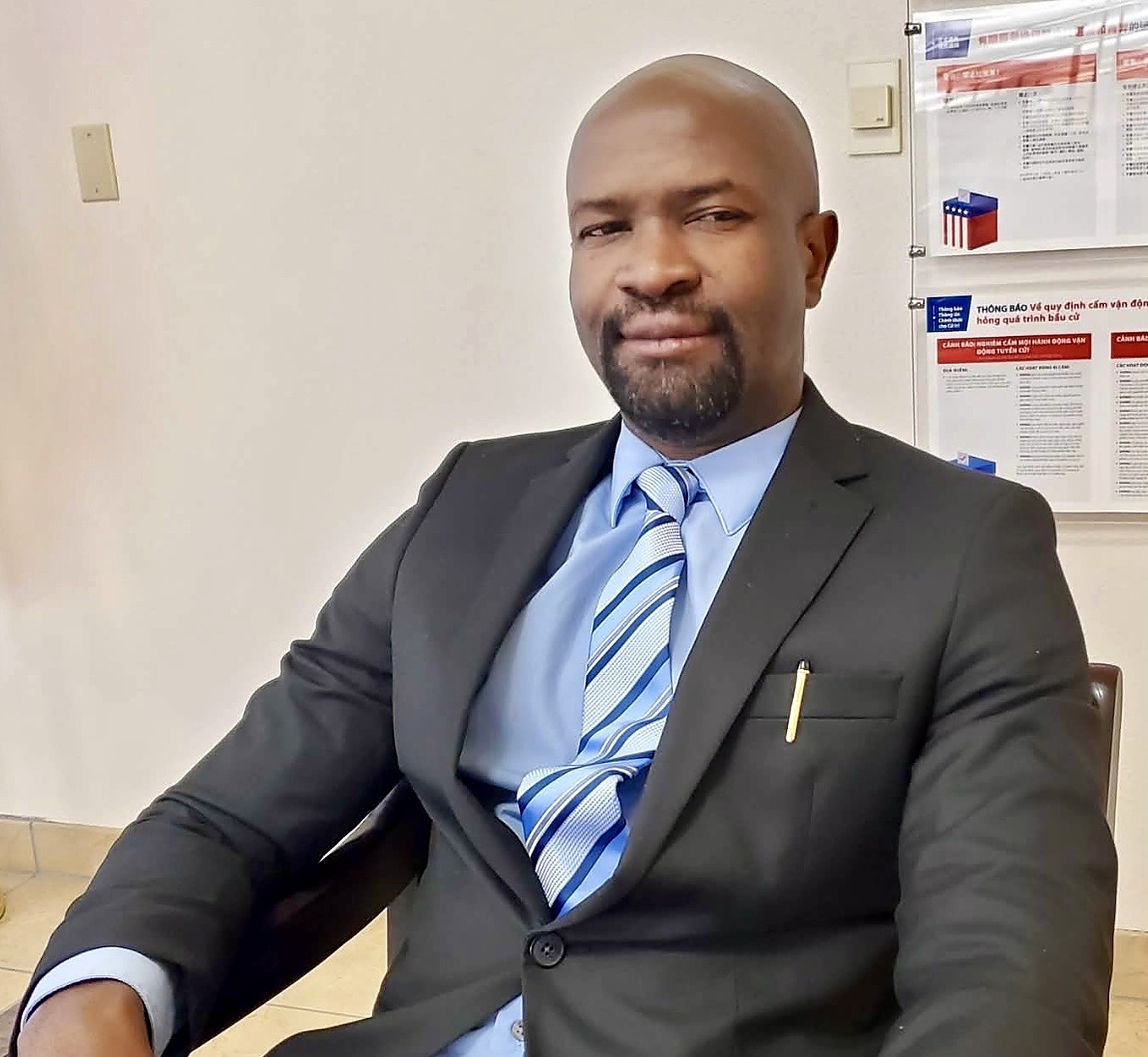 Ralph Nwobi, Attorney at Law, in professional business attire